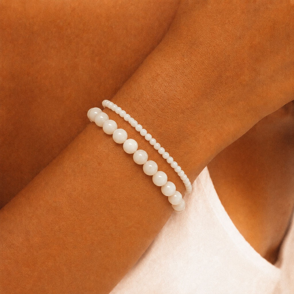 Alternate product view of Soft Tide White Shell Bracelet by AURAM with white shell beads for coastal layering