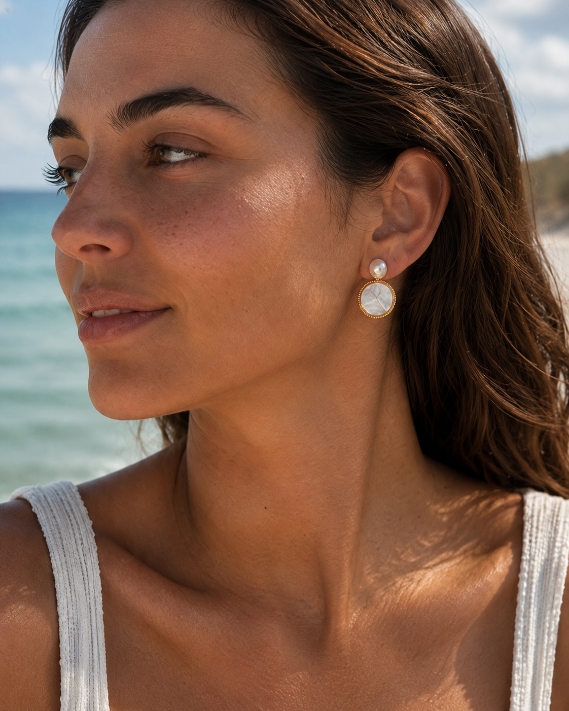 Alternate product view of Moonlit Shell Pearl Earrings by AURAM with shell-inspired pearl styling