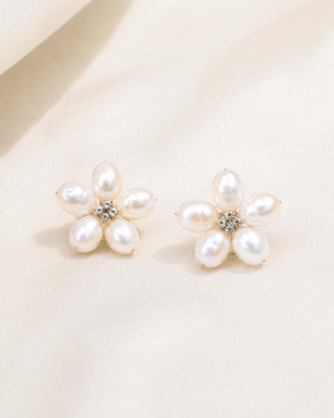 Alternate product view of Inner Bloom Pearl Earrings by AURAM with soft floral-inspired pearl styling