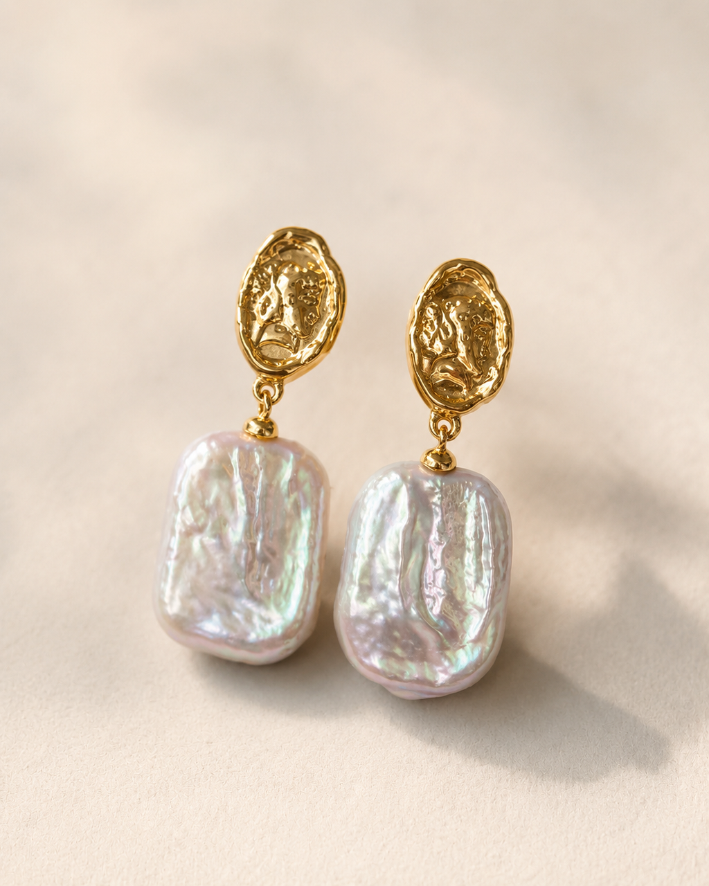 Detail view of Sunlit Relic Baroque Pearl Earrings by AURAM with organic baroque-style pearls