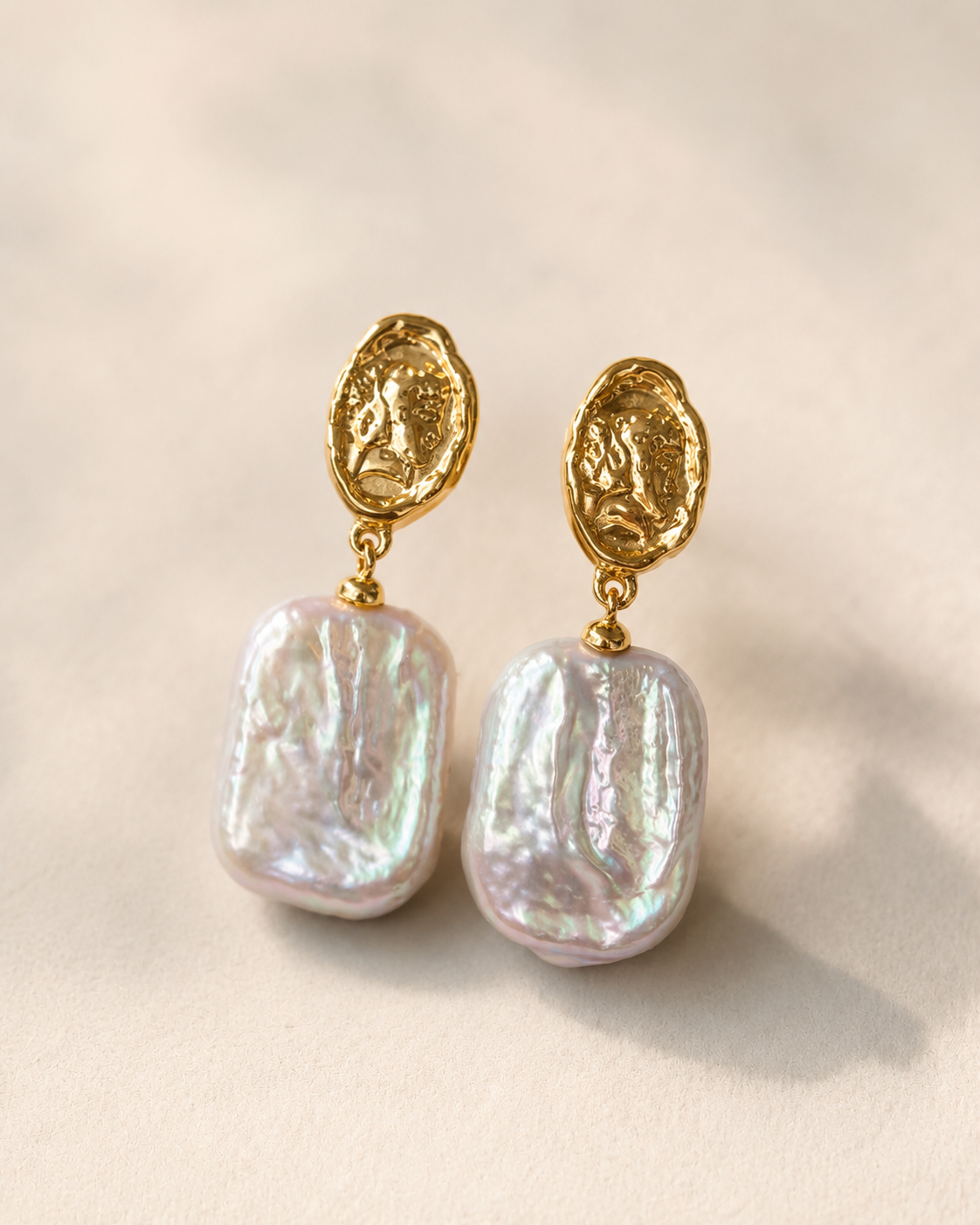 Detail view of Sunlit Relic Baroque Pearl Earrings by AURAM with organic baroque-style pearls
