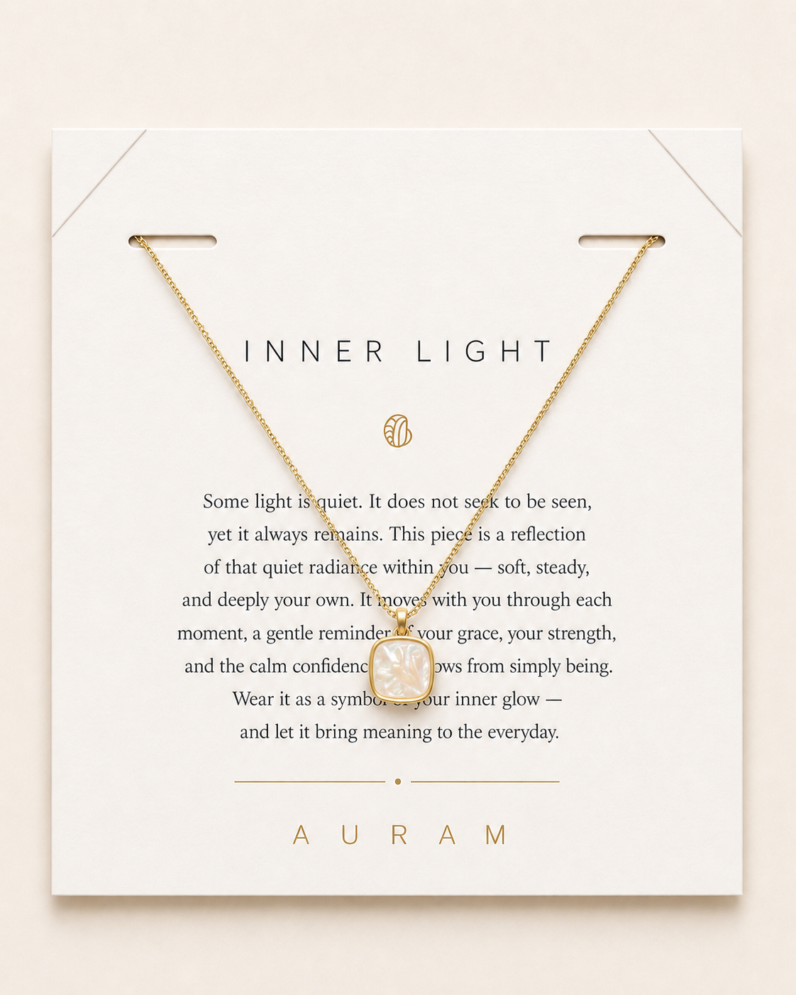 Shell Glow Pendant Necklace by AURAM on branded card with delicate gold-tone chain