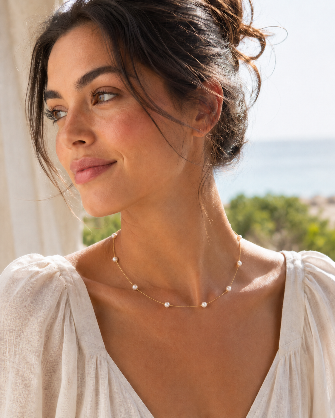 Detail view of Baroque Pearl Station Necklace by AURAM with organic pearl stations for layering