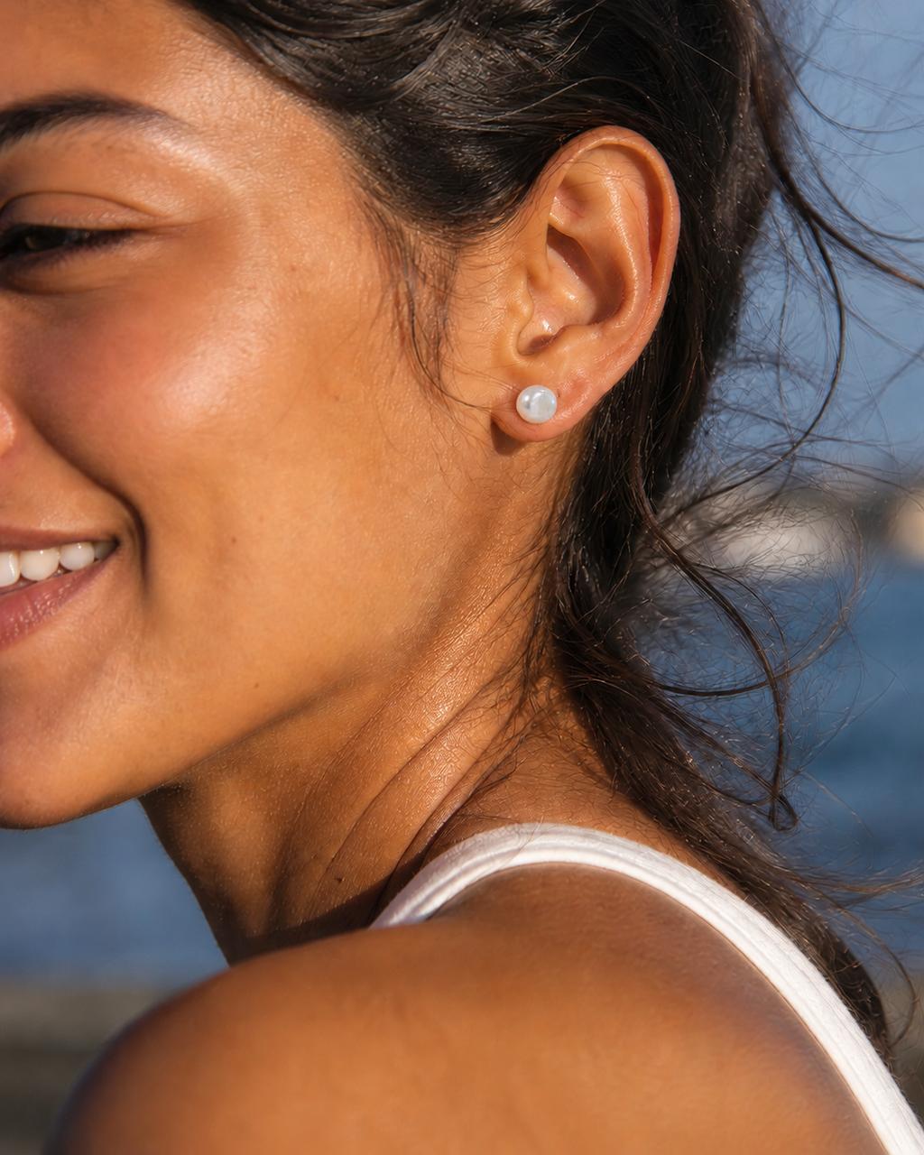 Additional view of Tiny Pearl Studs by AURAM, minimal everyday pearl stud earrings
